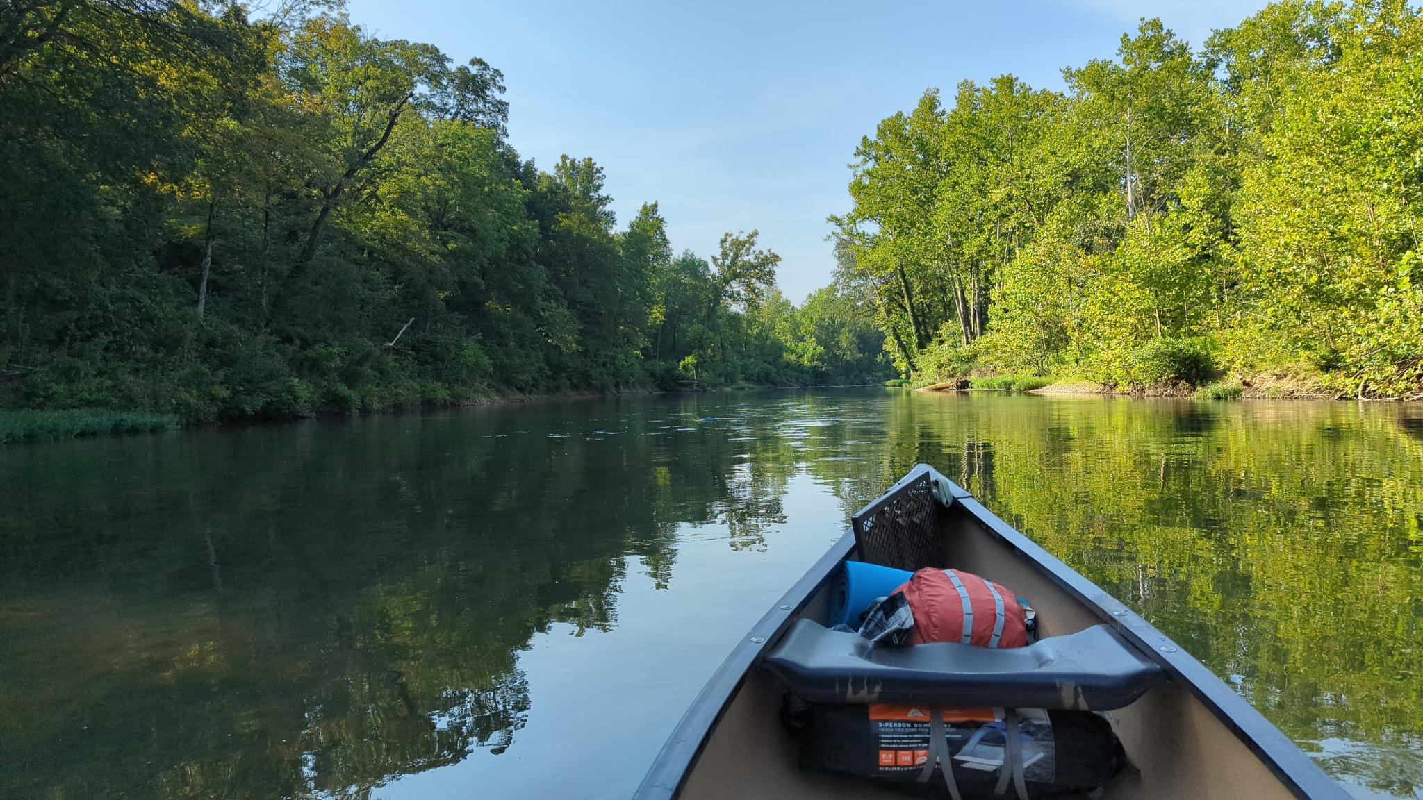 First person view canoeing down the Eleven Point River on one of the calmer portions of the river.